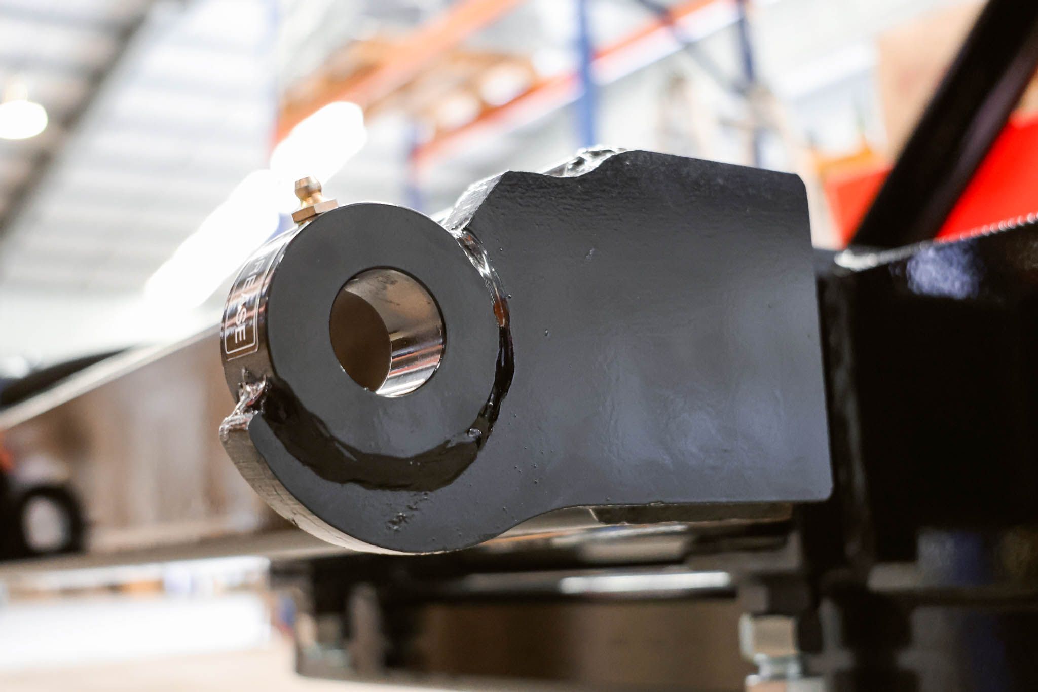 Weld-in and replaceable bushes for long-term serviceability and smooth operation