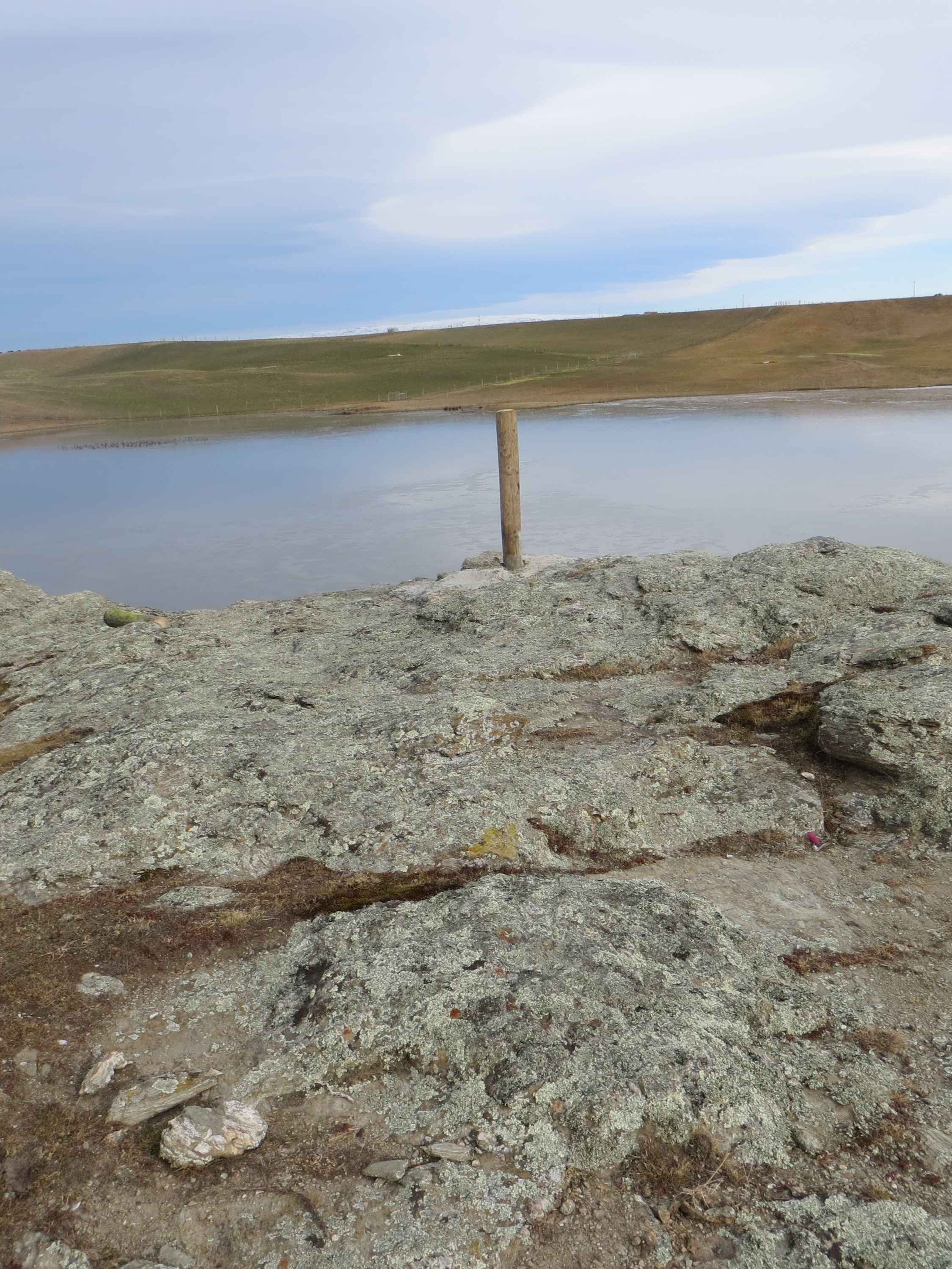 Fence post installed into solid rock after drilling a pilot hole with FencePro rock drill