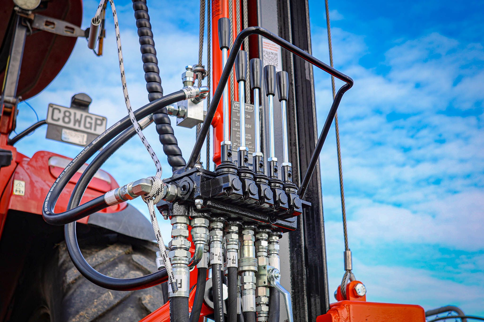 Custom-built Italian valve bank fitted to the FencePro Mule post driver.
