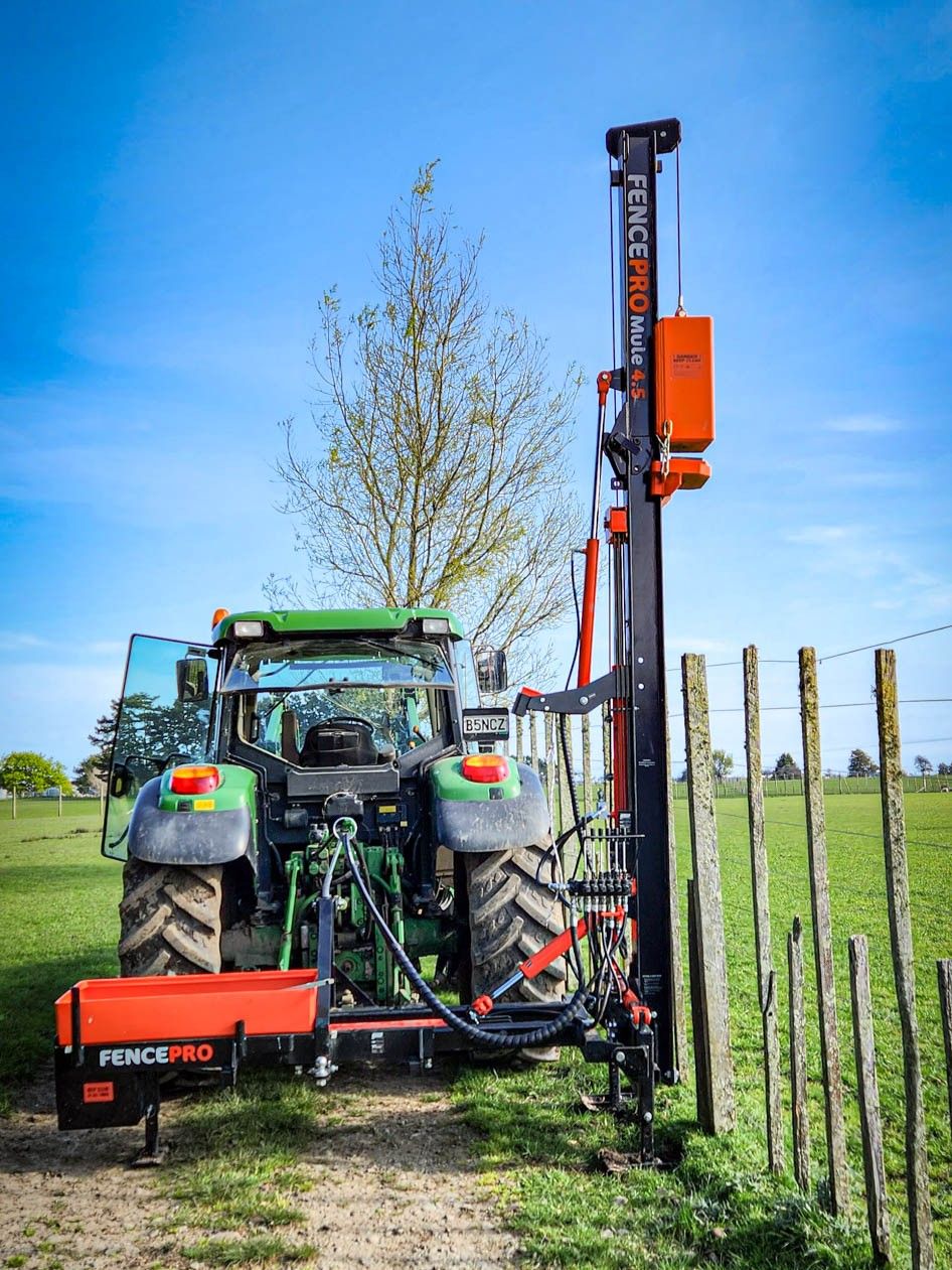 4.5 m Mule post driver with sidemount base in work position to driver fence post.