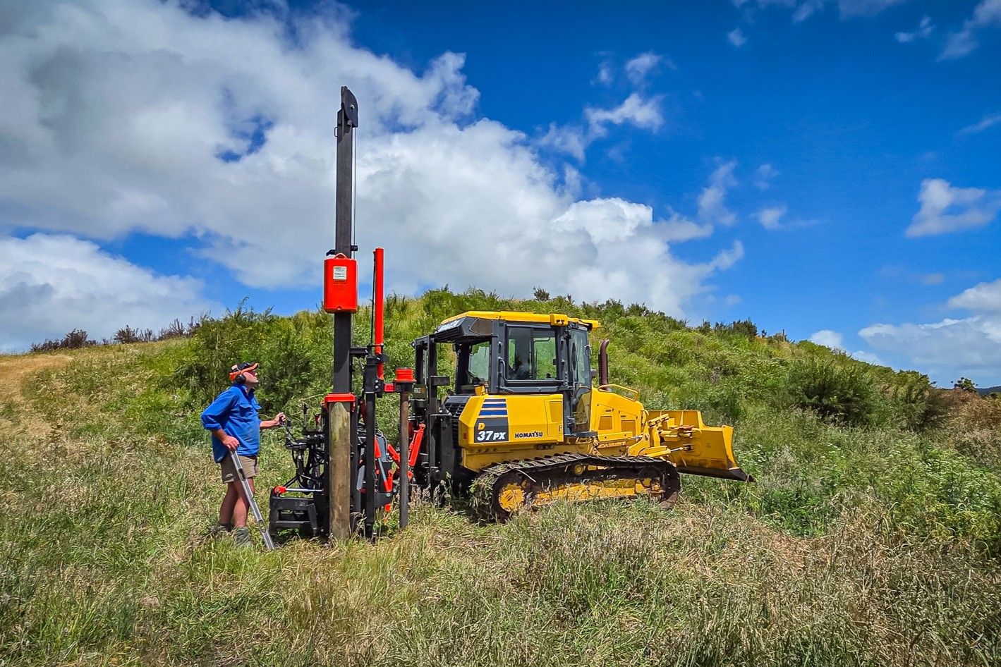 FencePro Ultra G2S post driver with PB650 130° rotating base mounted on bulldozer