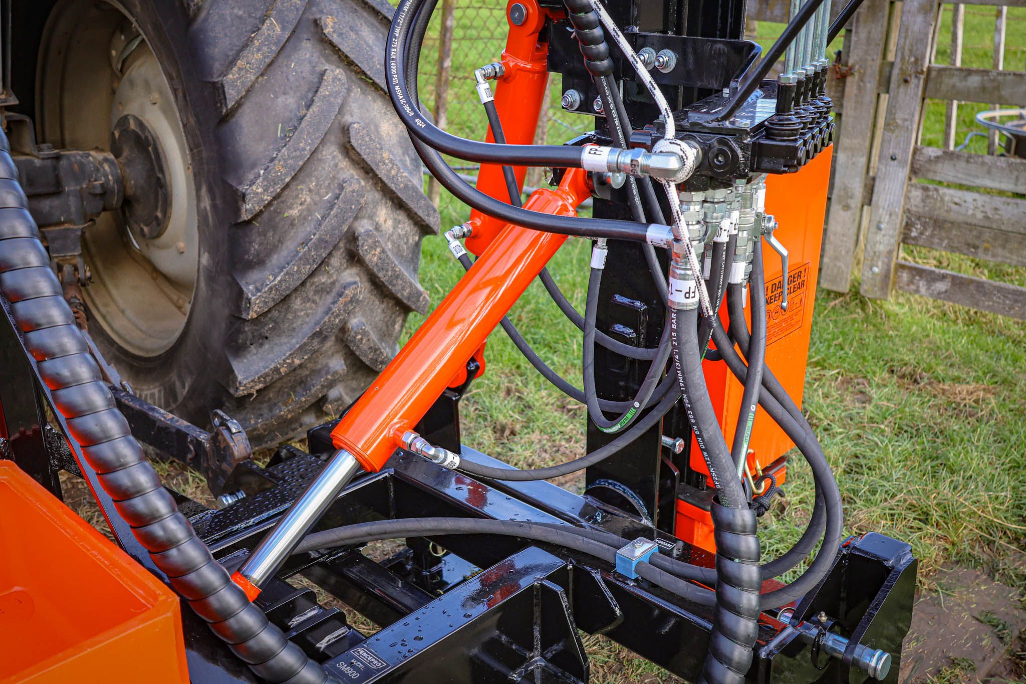 Hydraulic top link ram on the FencePro Mule post driver, giving 30° of variable tilt.