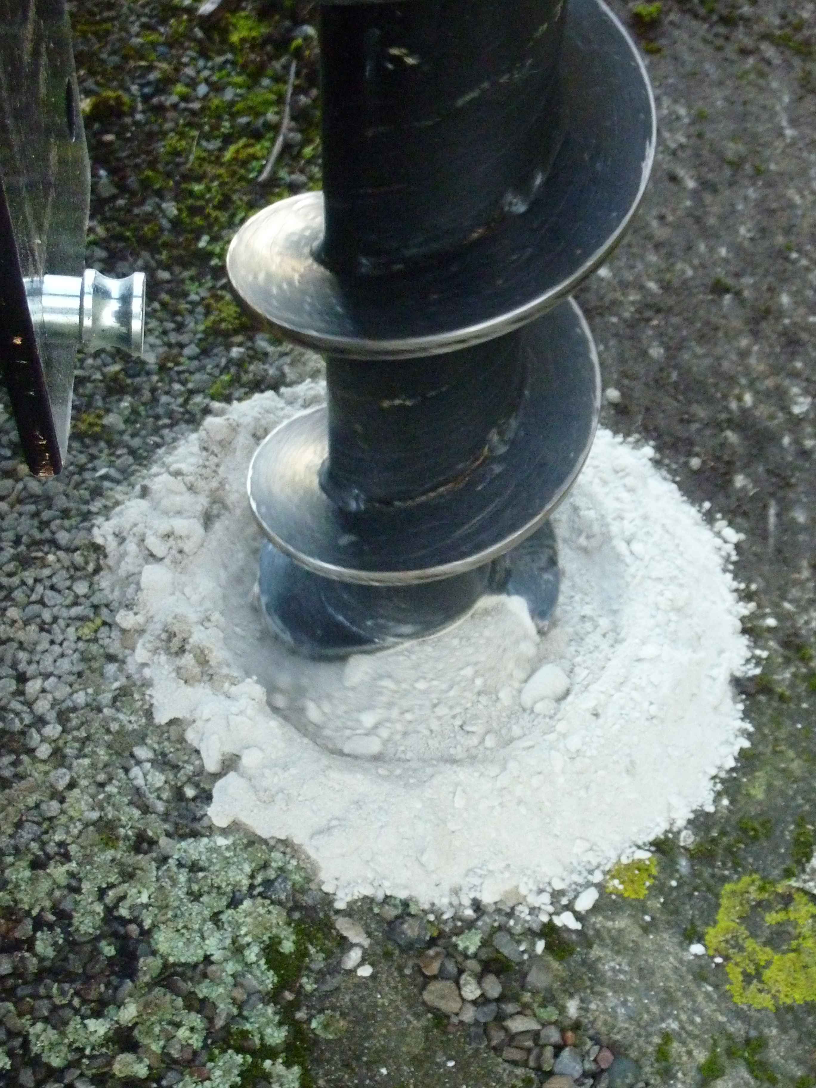 FencePro rock drill drilling/griding through extremely hard ground.